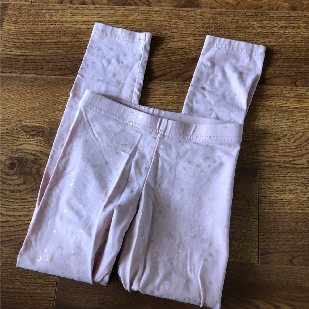 Old Navy pink star built in tough leggings in size S (6/7)